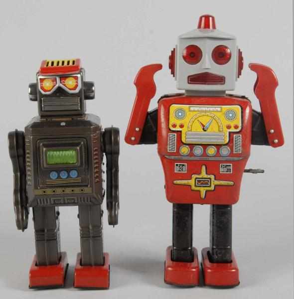 Appraisal: Lot of Tin Robot Toys Description Japanese Includes one wind-up