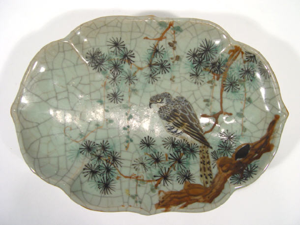 Appraisal: Chinese oval crackle glazed stoneware dish painted with a falcon