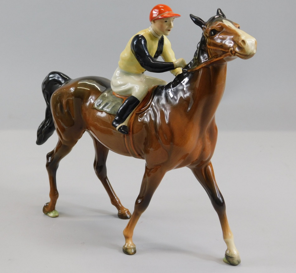 Appraisal: A Beswick ceramic model of a racehorse and jockey in