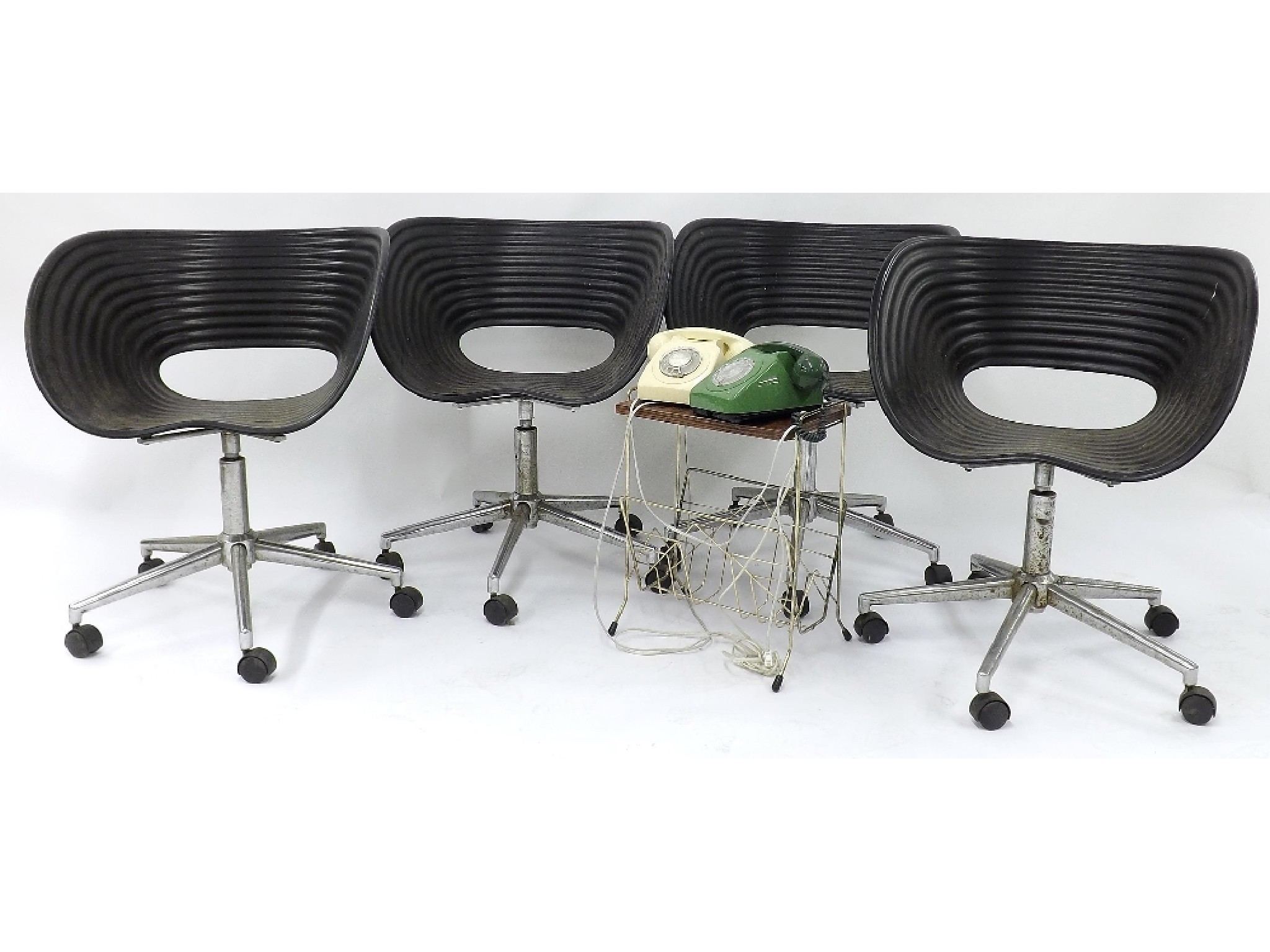 Appraisal: Set of four retro style desk chairs with ribbed shaped