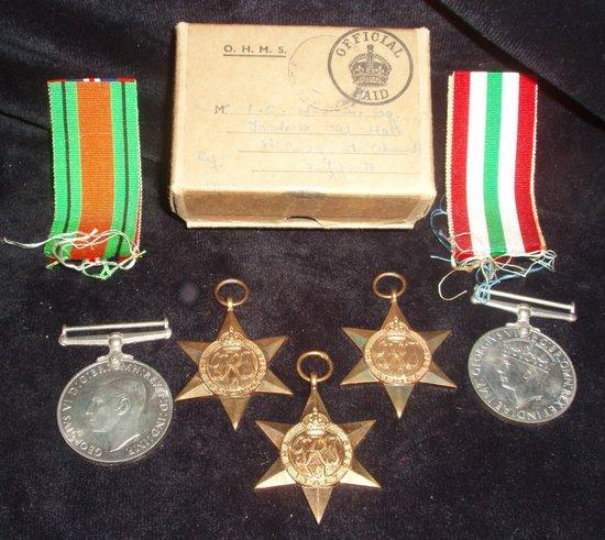 Appraisal: A small group of WWII medals including Defence medal Service