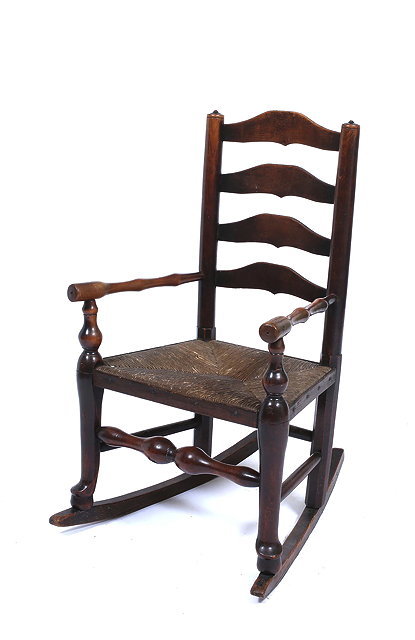 Appraisal: A TH CENTURY COUNTRY MADE CHILD'S ARMCHAIR with a ladder