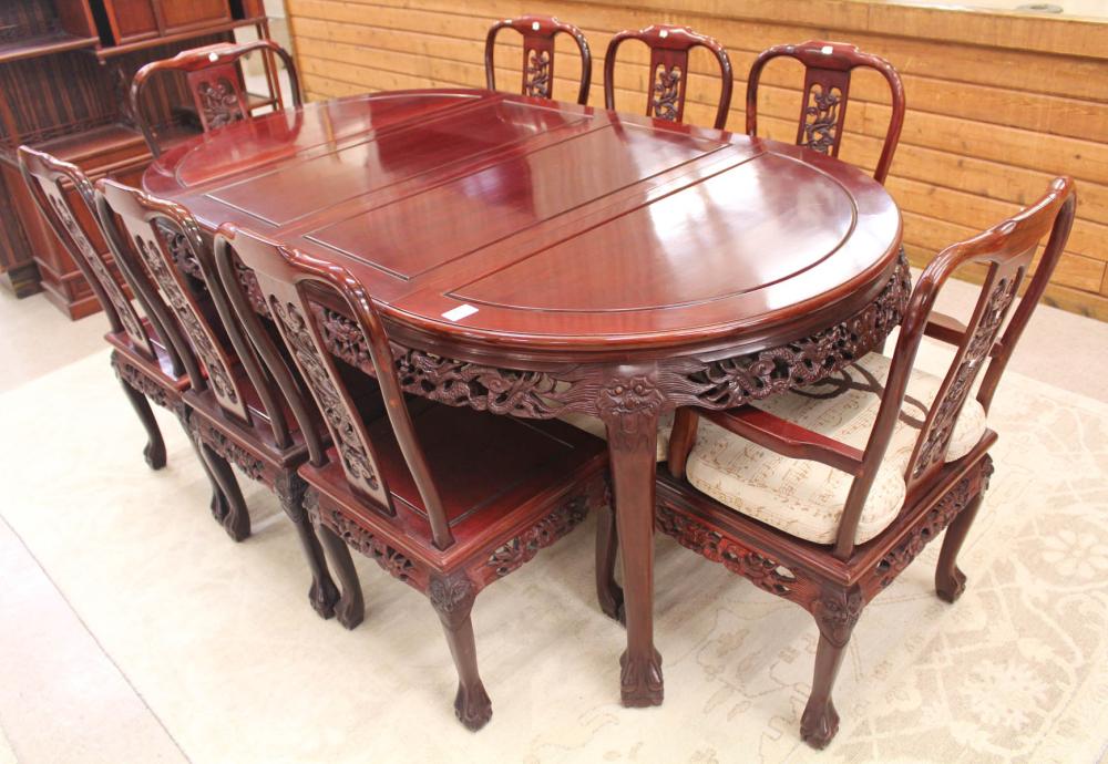 Appraisal: CHINESE ROSEWOOD DINING TABLE AND CHAIRS SET round dining table