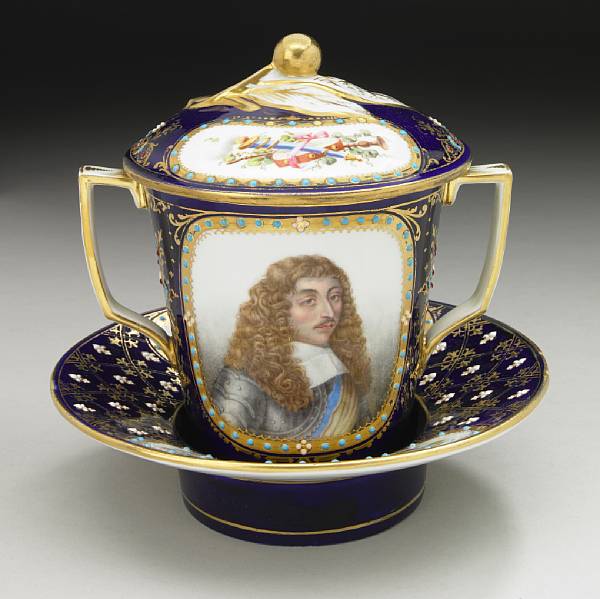 Appraisal: A S vres style jeweled porcelain covered two handled cup