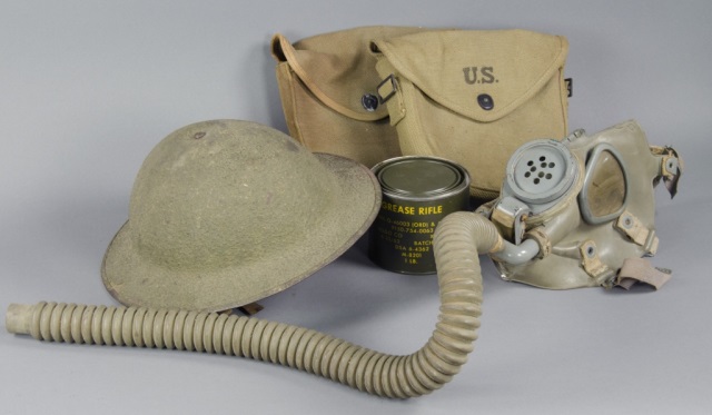 Appraisal: Doughboy HelmetPart of gas mask Along with two U S