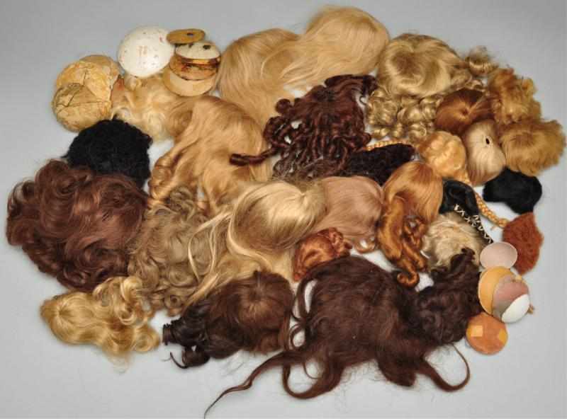 Appraisal: Lot of Wigs and Pates for Antique Dolls Description Mostly