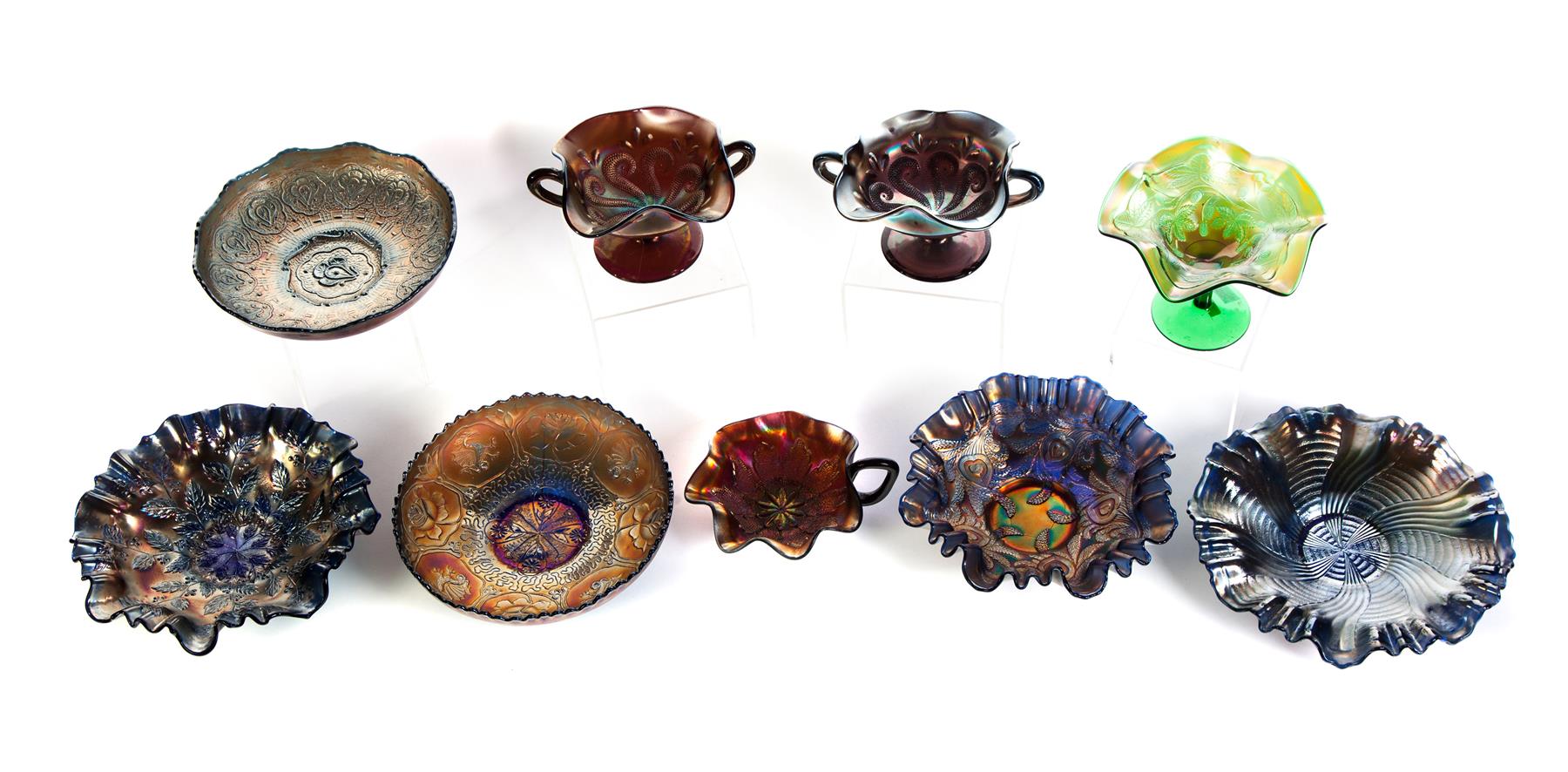 Appraisal: NINE PIECES OF CARNIVAL GLASS American th century Five center