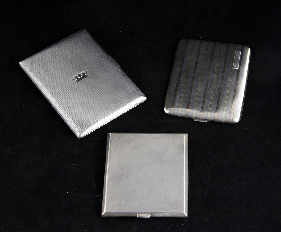 Appraisal: A silver cigarette case Goldsmiths Silversmiths Co Ltd London engine