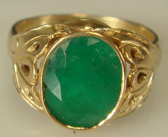 Appraisal: K yg Emerald Ring Center bezel set oval cut emerald