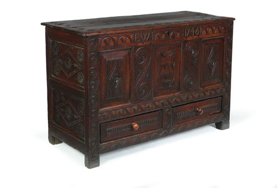 Appraisal: CARVED COFFER English th century oak Two drawers and elaborately