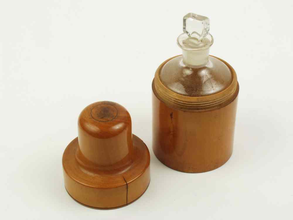 Appraisal: TREENWARE - Early treenware screw top container which holds a