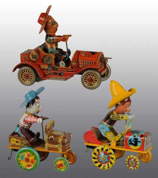 Appraisal: Lot of Tin Cowboy Whoopee Car Wind-Up Toys Description Beautiful