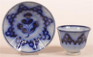 Appraisal: Flow Blue Skeleton Leaf Cup and Saucer Flow Blue Skeleton