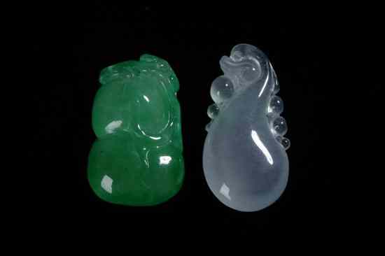 Appraisal: TWO CHINESE APPLE GREEN AND GREY JADEITE PENDANTS One double