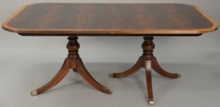 Appraisal: Ethan Allen mahogany dining table with banded inlaid top and