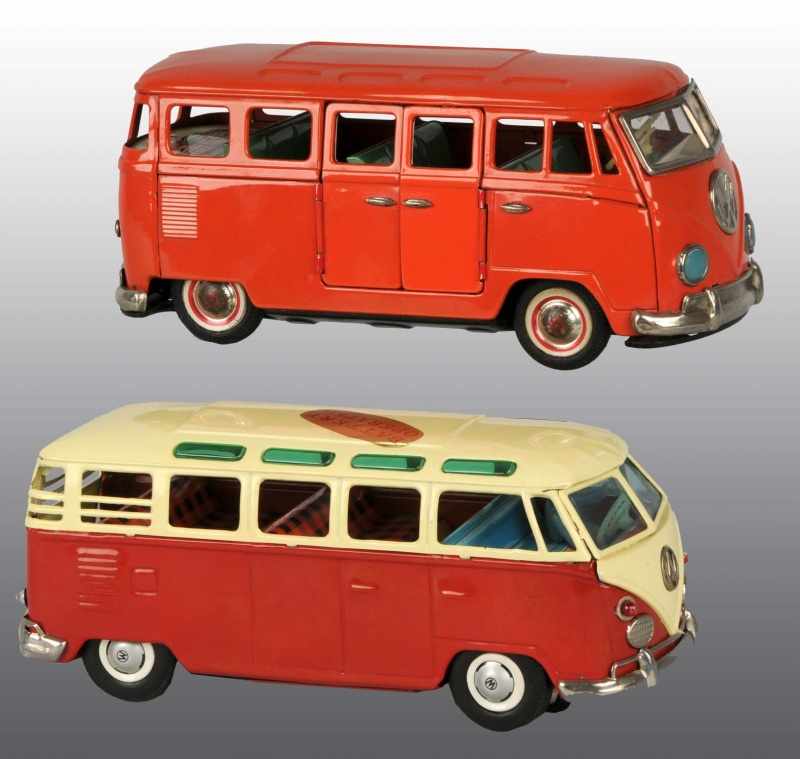 Appraisal: Lot of Tin Volkswagen Bus Toys Description Japanese Working Includes