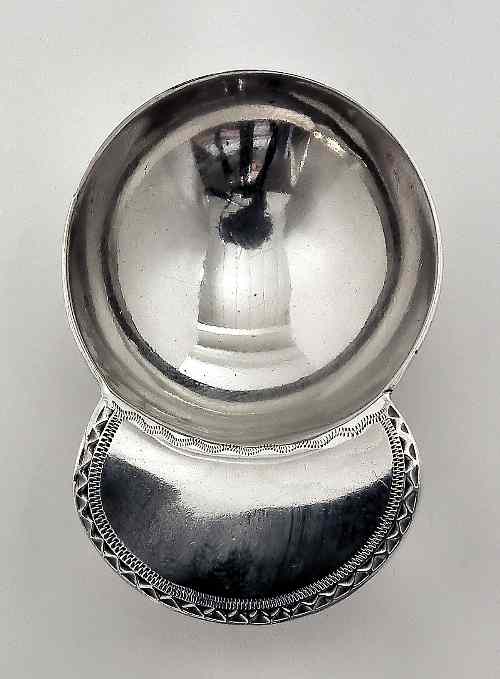 Appraisal: A George III silver caddy spoon in the ''Jockey Cap''