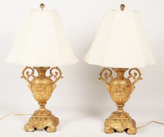 Appraisal: PAIR OF HIGHLY POLISHED GOLD GILT METAL URNS AS LAMPS