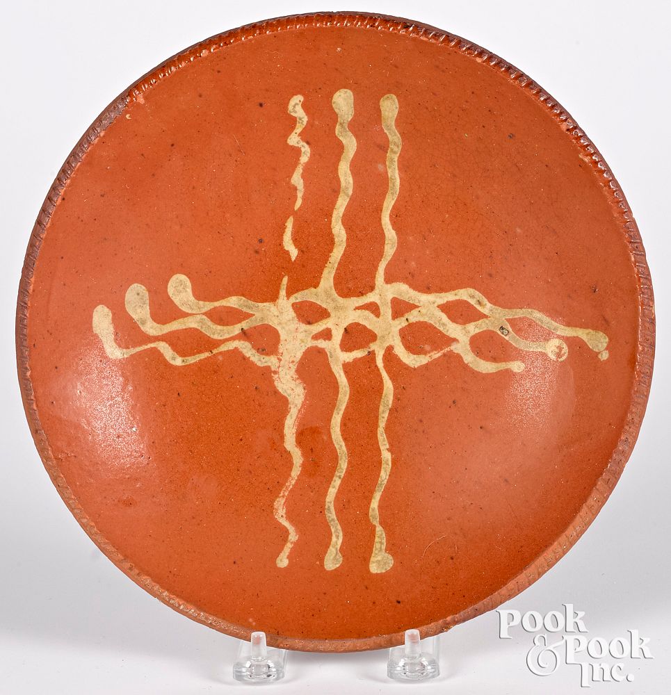 Appraisal: Pennsylvania redware plate th c Pennsylvania redware plate th c