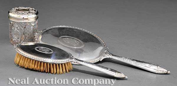 Appraisal: An American Art Deco Sterling Silver Hand Mirror and Hairbrush