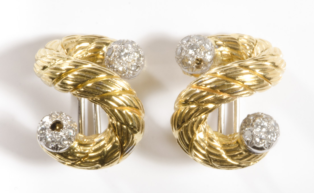 Appraisal: CARLO WEINGRILL UGO PICCINI DIAMOND AND EIGHTEEN KARAT GOLD EAR