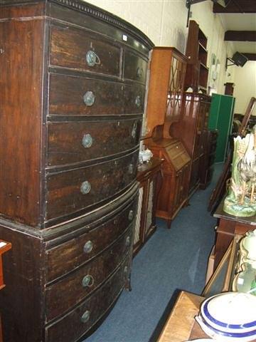 Appraisal: A George III mahogany bow fronted chest on chest the