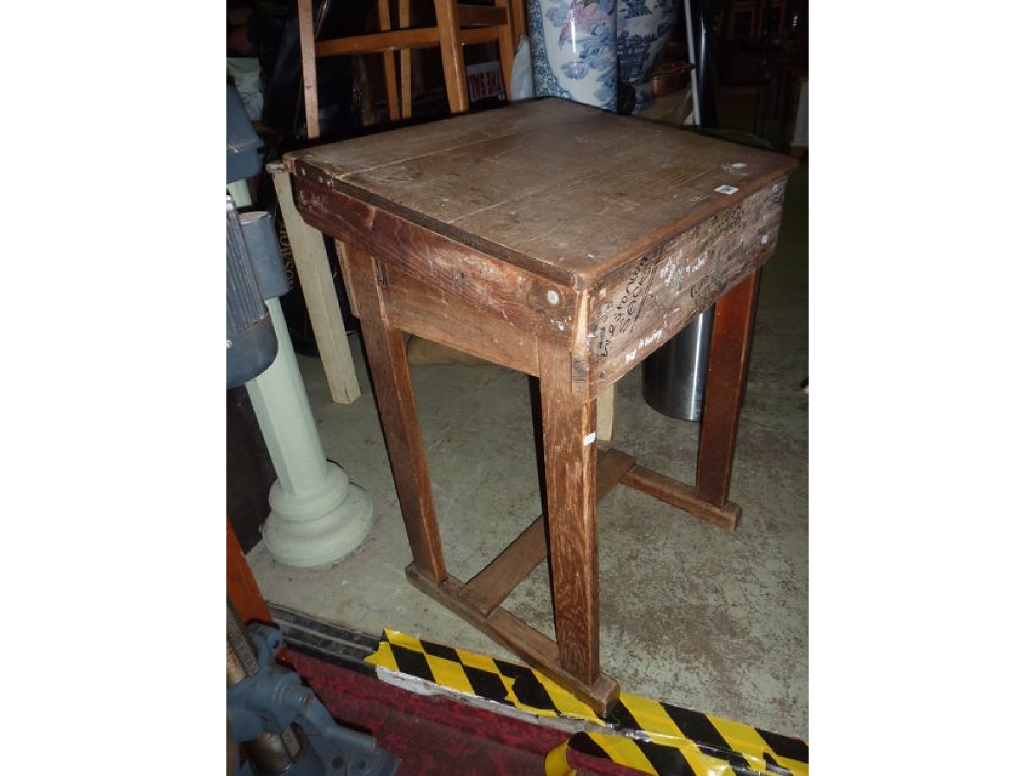 Appraisal: A vintage oak childs school desk with hinged slope