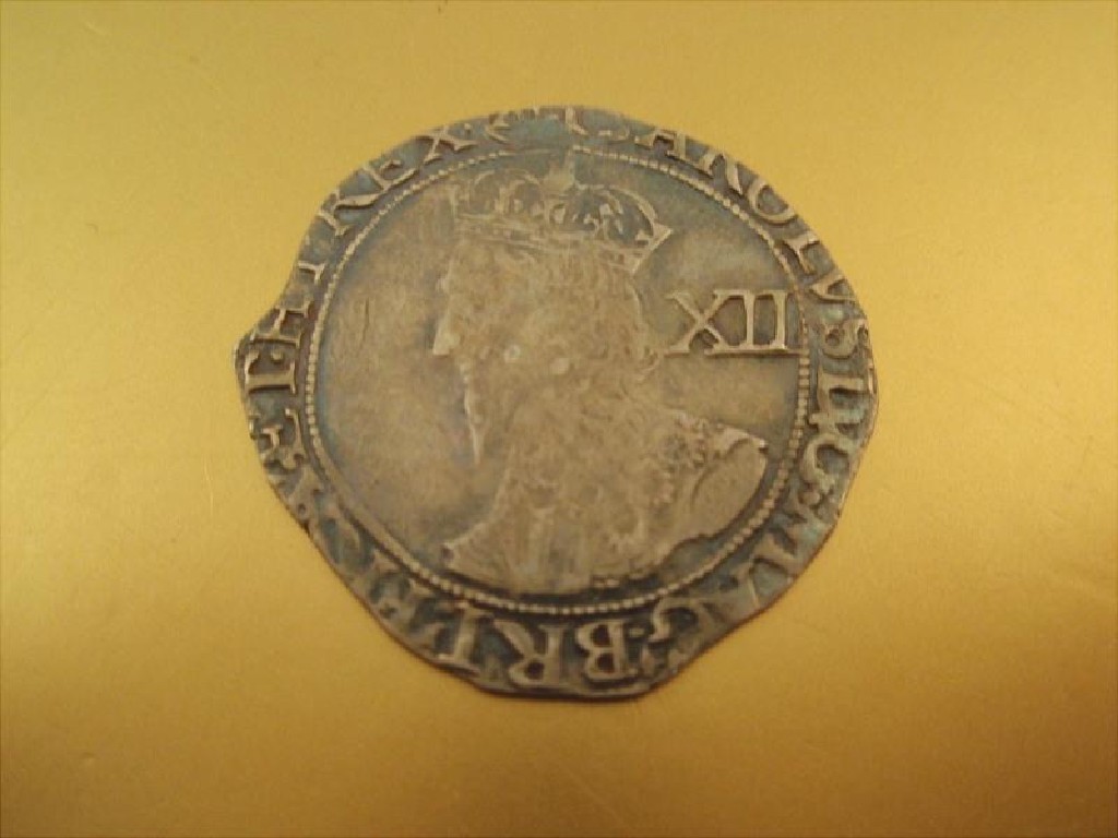 Appraisal: A Charles I hammered shilling with triangle in circle mint