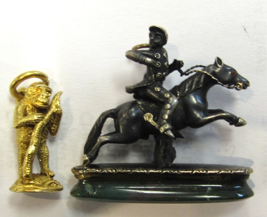 Appraisal: A silver and gilt mounted bloodstone seal designed as the