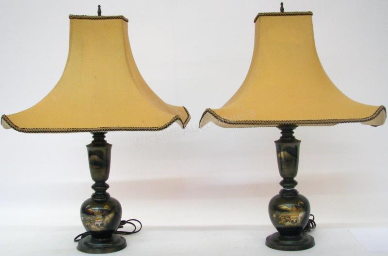 Appraisal: A pair of Oriental motif cast metal table lamps with