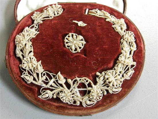 Appraisal: Ornate seed pearl necklace and brooch with original case PROVENANCE