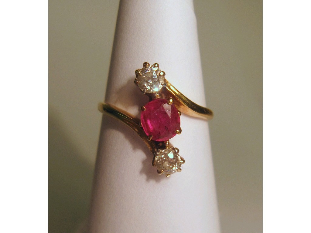 Appraisal: Edwardian ct gold ruby and diamond three stone twist ring