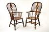 Appraisal: WINDSOR CHAIRS - Two similar yew wood English Windsor arm