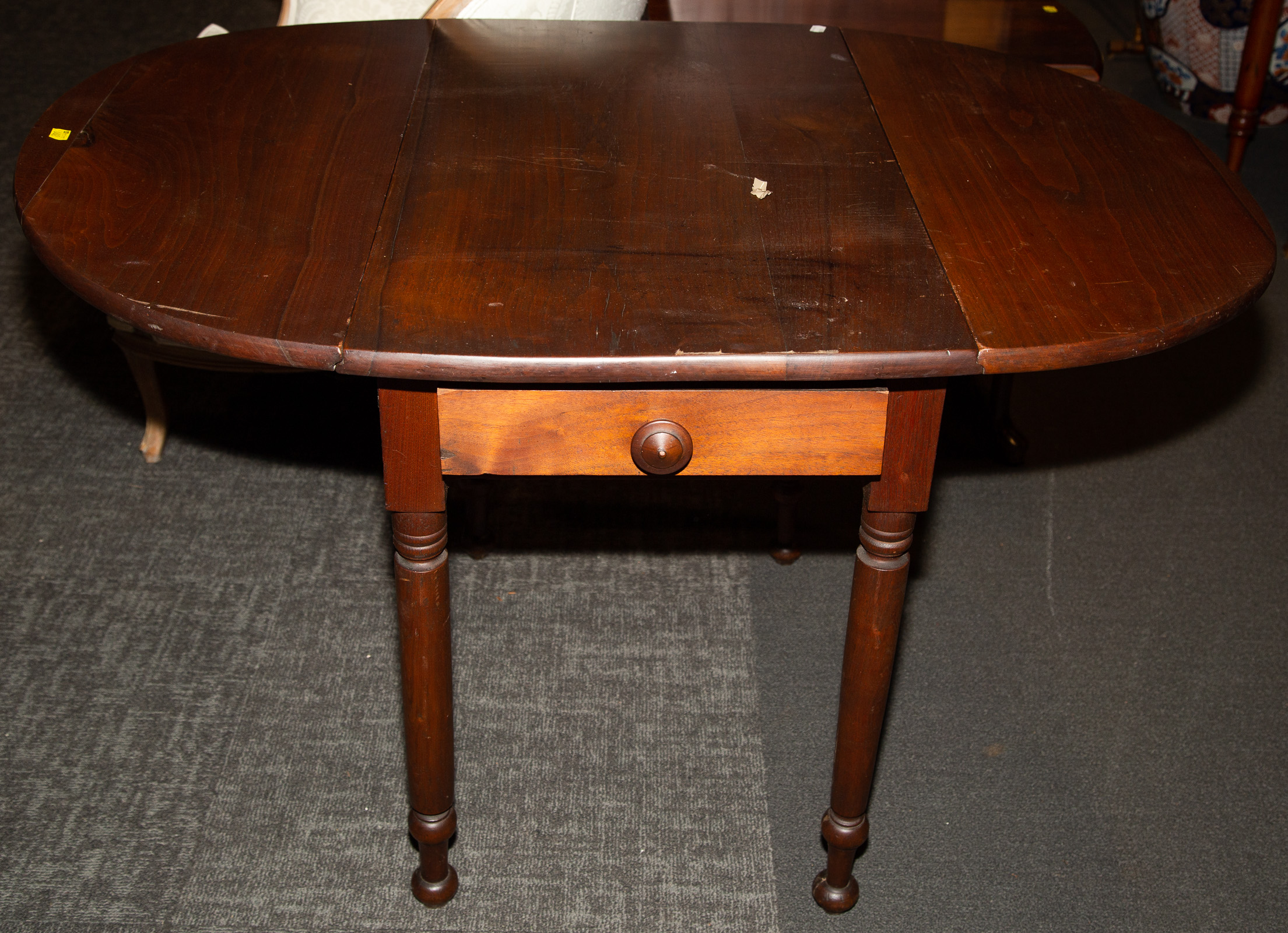 Appraisal: AMERICAN VERNACULAR BLACK WALNUT DROPLEAF TABLE rd quarter- th century