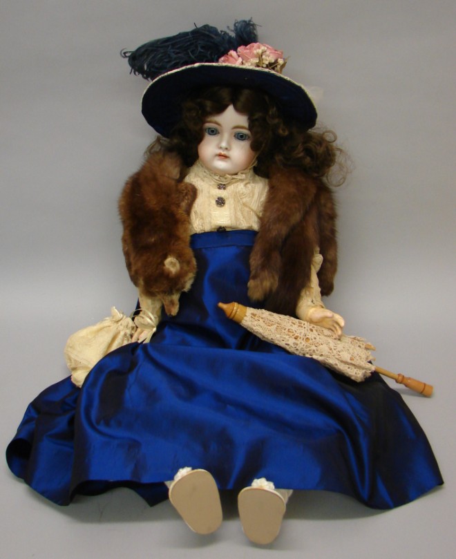 Appraisal: Doll with very pale bisque Blue sleep eyes open mouth