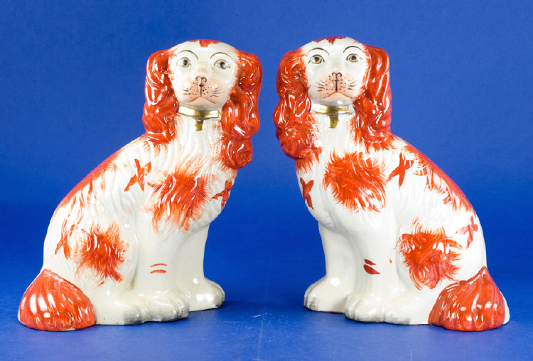 Appraisal: Pair of Staffordshire Dogs Coloured orange brown and white inches