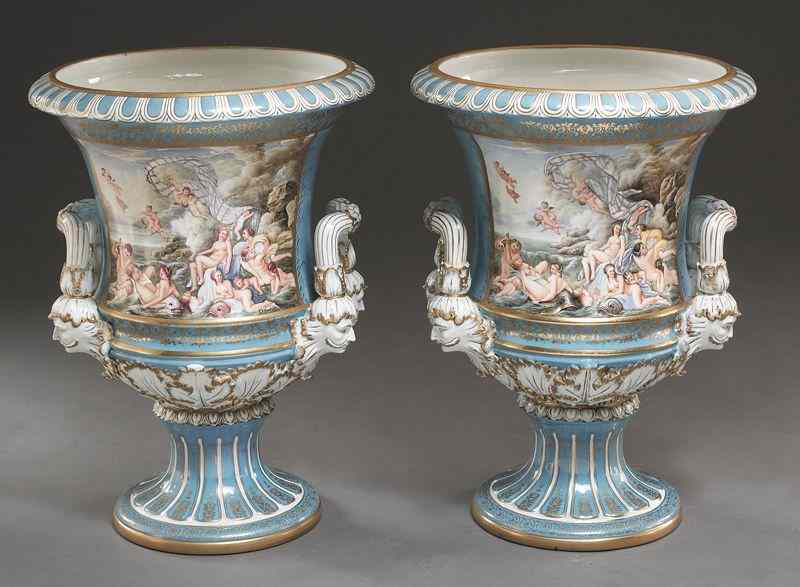 Appraisal: Pr Sevres style porcelain urns each with celesteblue ground and