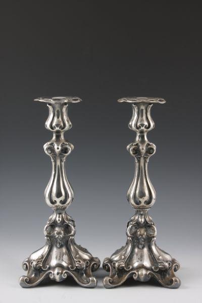 Appraisal: Pair of Silver Candlesticks Polish th c ornate baluster form