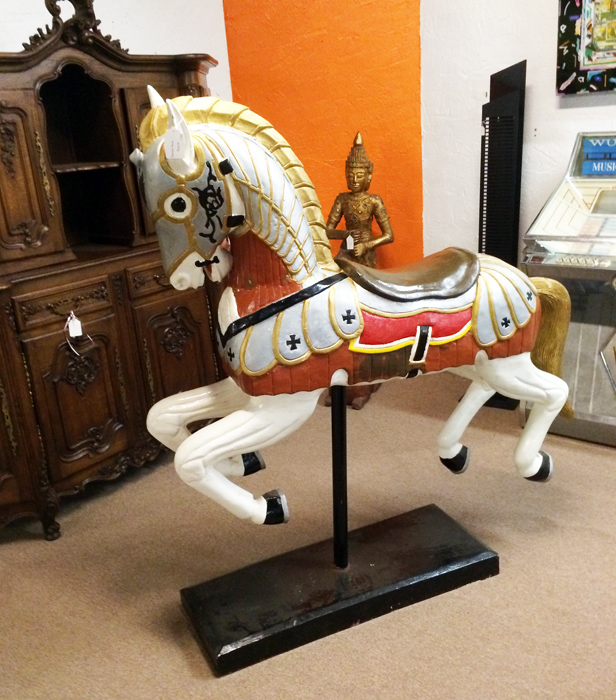 Appraisal: CARVED WOOD CAROUSEL HORSE th century carved and painted with