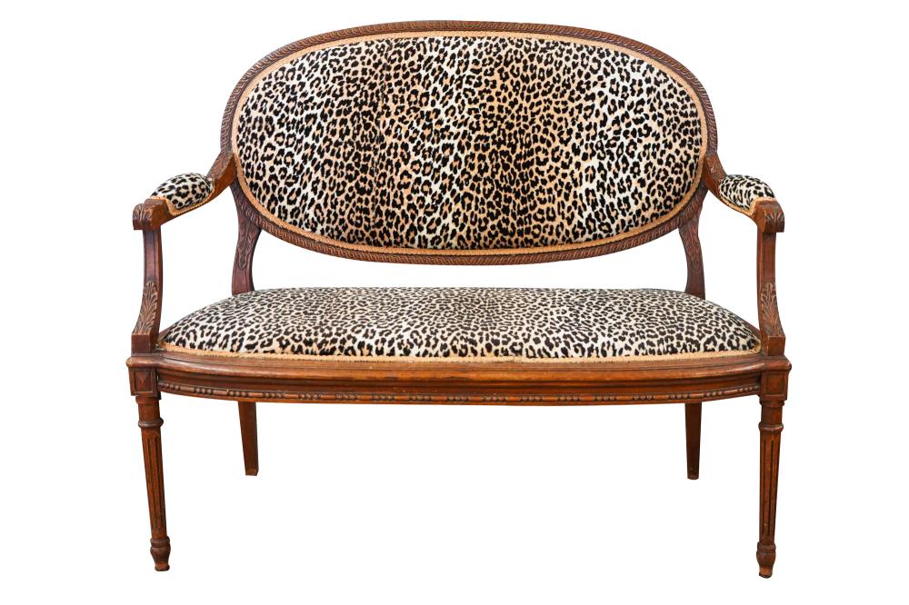 Appraisal: FRENCH LEOPARD PRINT UPHOLSTERED SETTEEin the Louis XVI style inches