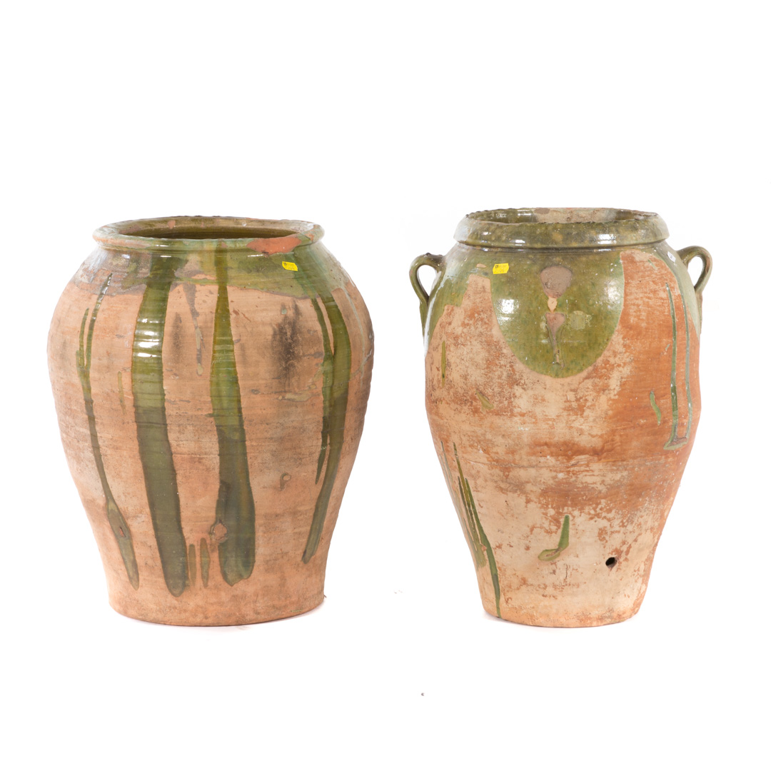 Appraisal: Two partially glazed earthenware pots and in H Condition Larger