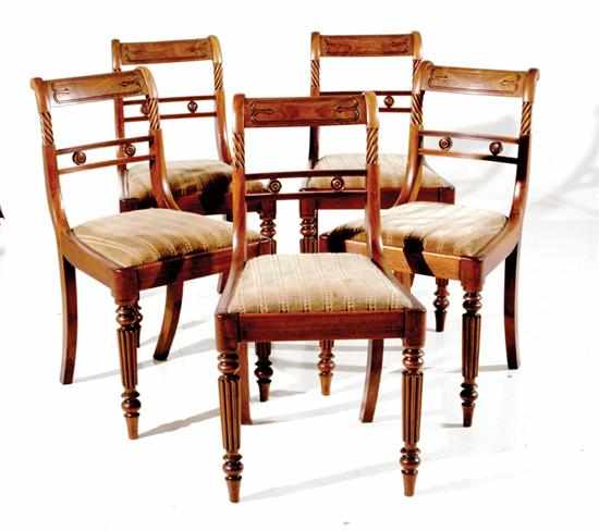 Appraisal: Regency mahogany sidechair set circa crest with lozenge carving over