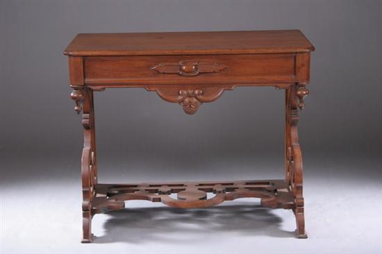 Appraisal: RENAISSANCE REVIVAL WALNUT CONSOLE TABLE Circa Cabochon-carved frieze with pendant