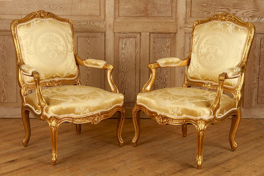 Appraisal: PAIR GILT CARVED OPEN ARM CHAIRS CIRCA A pair of