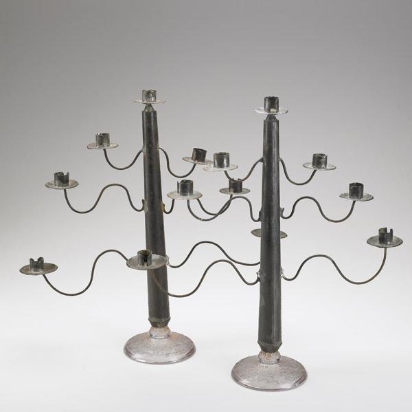 Appraisal: TOLEWARE CANDELABRA Mounted on sandwich type glass bases six arms