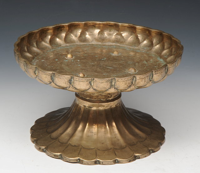 Appraisal: AN INDIAN BRONZE TAZZA OR ROSE PETAL DISH of pedestal