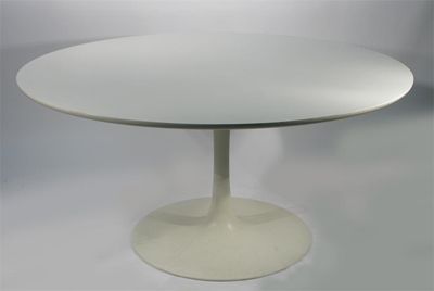 Appraisal: A Tulip table designed by Eero Saarinen white laminated circular