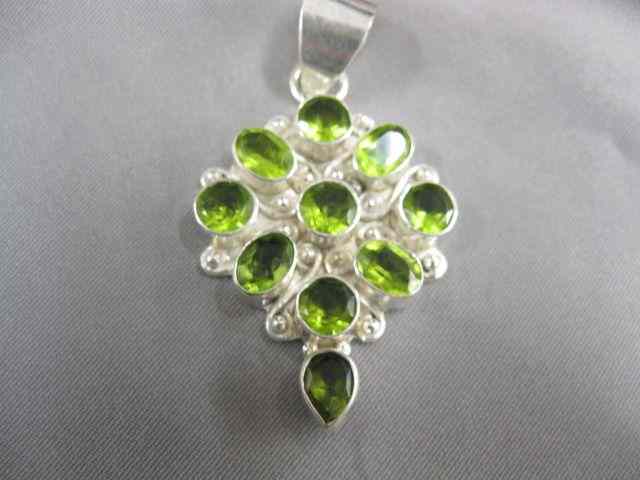 Appraisal: Peridot Pendant rich gems in sterling silver '' x ''