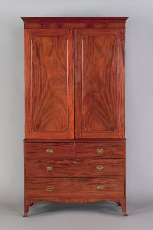 Appraisal: Mid Atlantic mahogany linen press ca having two doors with