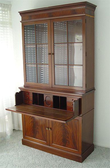 Appraisal: MAHOGANY SECRETARY BOOKCASE Early th C secretary bookcase richly grained